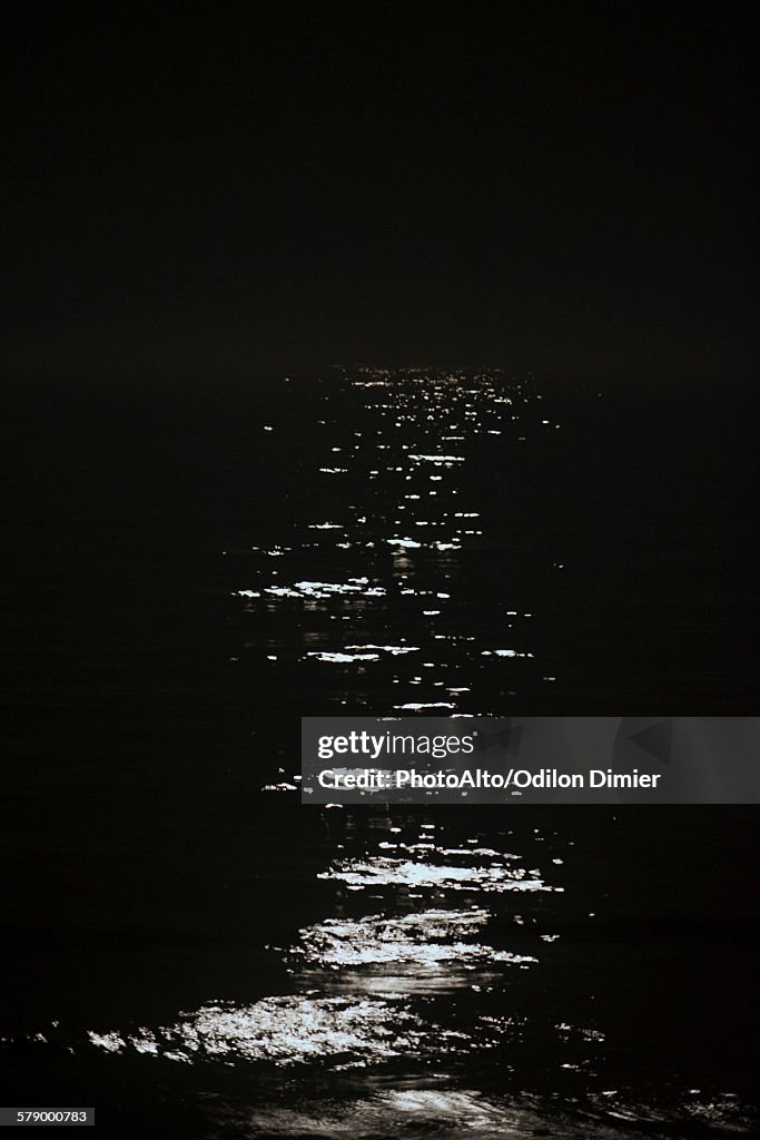 Moonlight reflected by water at night