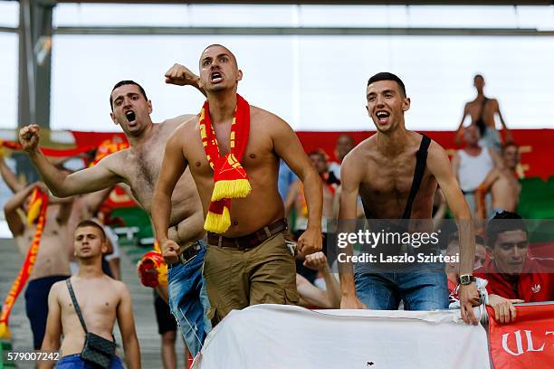 The fans of FK Partizani celebrate the equalizer goal during the UEFA Champions League Qualifying Round match between Ferencvarosi TC and FK...