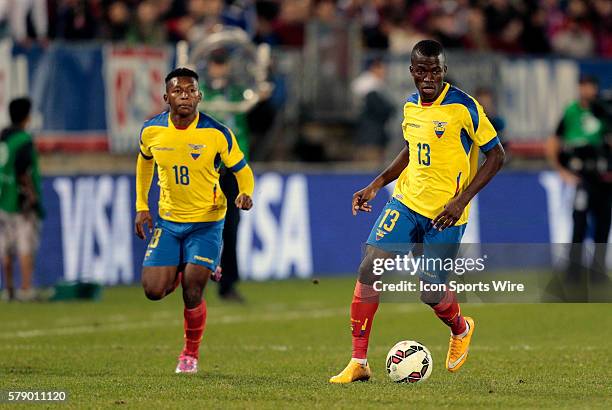 Ecuador's Enner Valencia brings the ball up as Ecuador's Jonathan Gonzalez makes an overlapping run. The Men's National Team of the United States and...