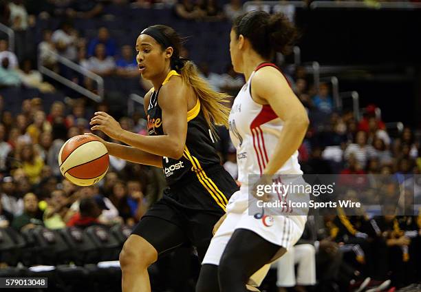 Bria Hartley of the Washington Mystics runs up on Skylar Diggins of the Tulsa Shock during a WNBA game at Verizon Center, in Washington D.C. Mystics...