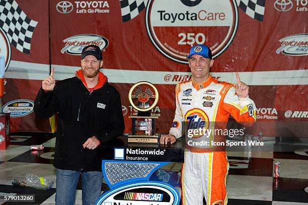 Kevin Harvick and team owed Dale Earnhardt Jr. Pose for pictures in Victory Lane after the NASCAR Nationwide Series ToyotaCare 250 Kevin Harvick...