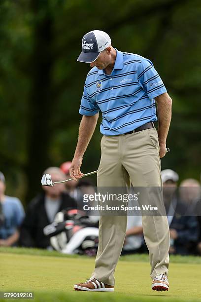 Jim Furyk reacts after missing his putt on the 2nd hole during the final round of the 2014 RBC Canadian Open at the Royal Montreal Golf Club in Ile...