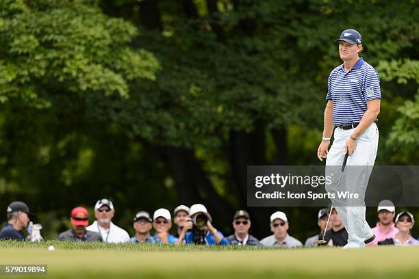 Ernie Els of South Africa reacts after missing the putt on the 5th hole during the third round of the 2014 RBC Canadian Open at the Royal Montreal...