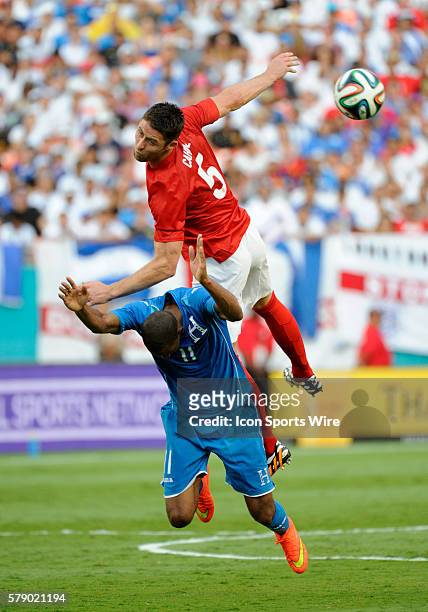 England Defender Gary Cahill heads the ball on top of Honduras Forward Jerry Bengtson during an international friendly world cup warm up soccer match...