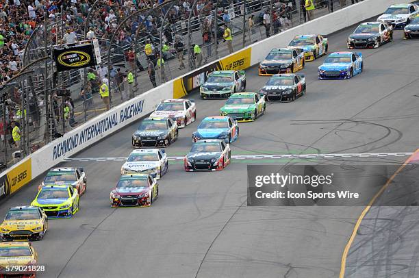 Racing actio during the Sprint Cup Series Toyota Owners 400. Joey Logano Penske Racing Shell/Pennzoil Ford Fusion won at Richmond International...