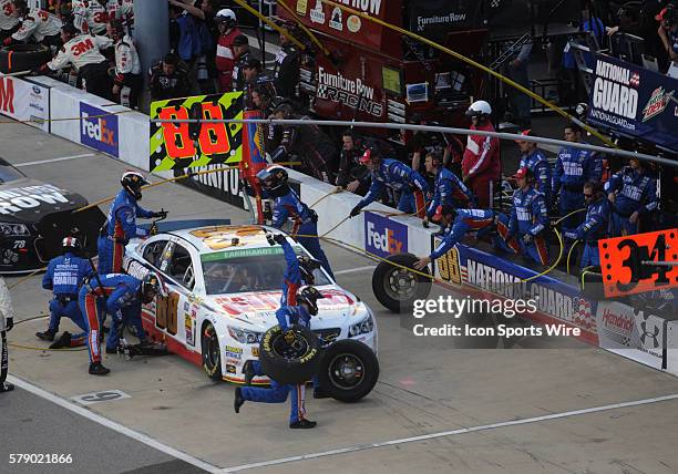 Dale Earnhardt Jr. Hendrick Motorsports National Guard Chevrolet SS receives during a pitstop during the Sprint Cup Series Toyota Owners 400. Joey...