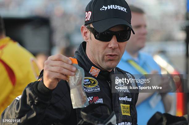 Matt Kenseth Joe Gibbs Racing Home Depot/Husky Toyota Camry before the Sprint Cup Series Toyota Owners 400. Joey Logano Penske Racing Shell/Pennzoil...