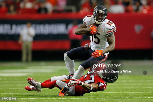 Chicago Bears wide receiver Brandon Marshall is brought down by Atlanta Falcons cornerback Robert McClain in the Chicago Bears 27-13 victory over the...