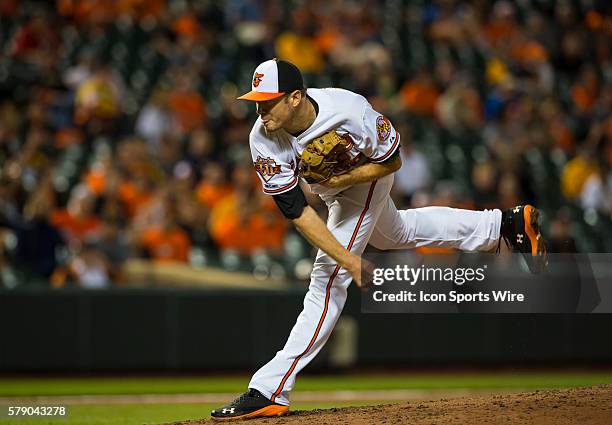 Baltimore Orioles starting pitcher Chris Tillman lets one fly towards home plate during the second game in an Interleague Major League Baseball...