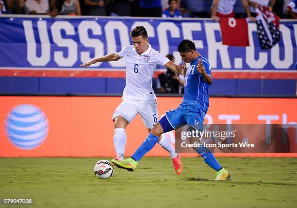United States Midfielder Alfredo Morales and Honduras Midfielder Edder Delgado fight for the ball during an international friendly between the US...