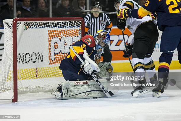 October 15, 2014. Erie Otters goalie Devin Williams makes a save during a game between the London Knights and the Erie Otters played at Budweiser...