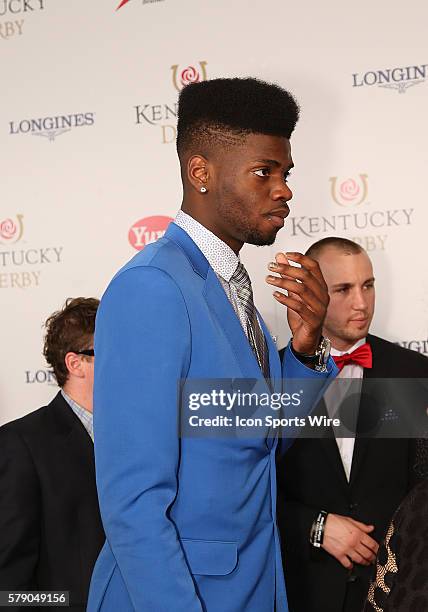 Nerlens Noel of the NBA's Philadelphia 76ers arrives on the red carpet before the 140th running of the Kentucky Derby at Churchill Downs in...