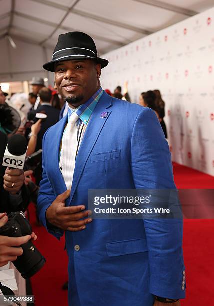Former Major League Baseball star Ken Griffey Jr. Arrives on the red carpet before the 140th running of the Kentucky Derby at Churchill Downs in...