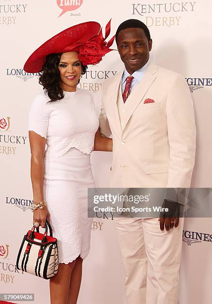 Former NBA player and current ESPN analyst Avery Johnson and his wife, Cassandra, arrive on the red carpet before the 140th running of the Kentucky...