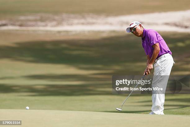 Toru Taniguchi putts the ball during the first round of the 114th U.S. Open Championship at the Pinehurst No. 2 in Pinehurst, North Carolina.