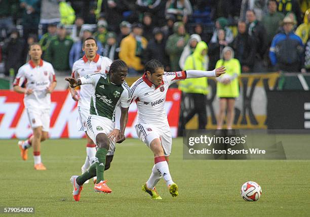 May 03, 2014 - Portland Timbers M Diego Chara battles DC United F Fabian Espinoza for the ball during a Major League Soccer game between the Portland...