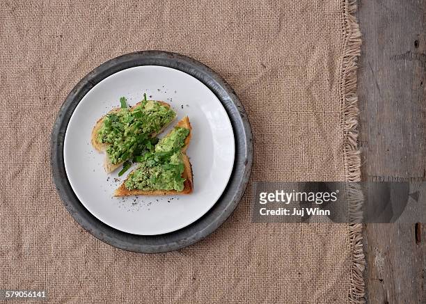 avocado on toast - juj winn avocado toast stock pictures, royalty-free photos & images