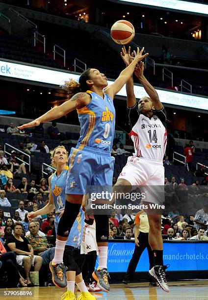 Courtney Clements of the Chicago Sky attempts to block a shot by Tierra Ruffin-Pratt of the Washington Mystics during a WNBA game at Verizon Center,...