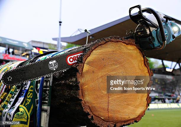 May 03, 2014 - A log adorned with Timbers scarves and chain saw sits near the Timbers Army section of the stadium during a Major League Soccer game...