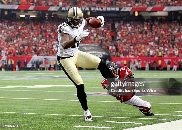 New Orleans Saints wide receiver Marques Colston is tackled by Atlanta Falcons cornerback Robert McClain in the Atlanta Falcons 37-34 victory over...