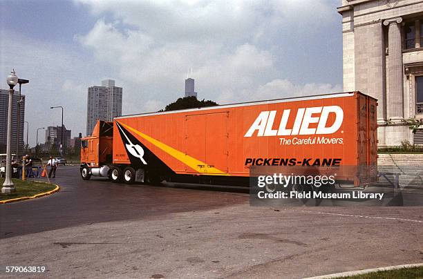 Allied Van lines semitrailer truck leaving Museum Preparing Sue T-Rex / Tyrannosaurus Rex skull for being sent to California for CT scan process.