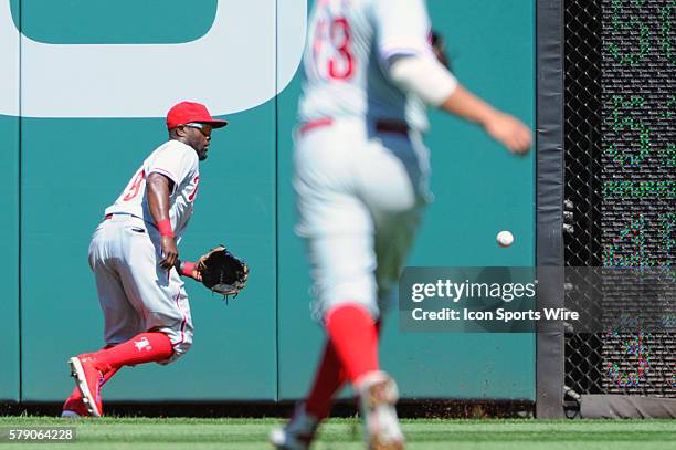 Philadelphia Phillies left fielder Domonic Brown loses the ball in the sun at Nationals Park in Washington, D.C. Where the Washington Nationals...