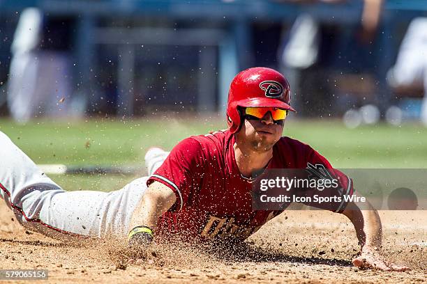 Arizona Diamondbacks Outfield Ender Inciarte [10449] slides into home during the Major League Baseball game between the Los Angeles Dodgers and the...