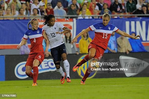 Tampa, Florida, USA, Allie Long # of the USA, Becky Sauerbrunn of the USA and Elodie Thomis of France during USA v France friendly International...