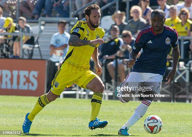 Steve Clark of the Columbus Crew and Nigel Reo-Coker of the Chivas USA during the game the game between the Columbus Crew and Chivas USA at the Crew...