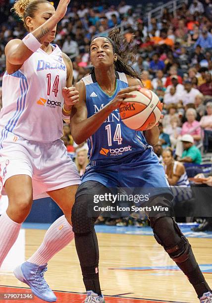 Minnesota's Devereaux Peters is being defended by Atlanta's Erika de Souza in Atlanta Dream 85-82 victory over the Minnesota Lynx at Philips Arena in...