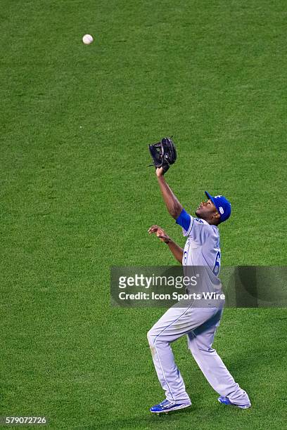 Kansas City Royals center fielder Lorenzo Cain catches a deep fly ball in the 4th inning, during game three of the World Series between the San...
