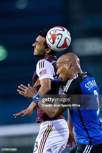 Colorado Rapids forward Kamani Hill and San Jose Earthquakes defender/midfielder Jordan Stewart battle to get a head on the ball, during the game...