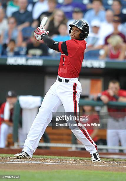 Cardinal outfielder Corey Ray swings during the College World Series game between the Vanderbilt Commodores and the Louisville Cardinals at TD...