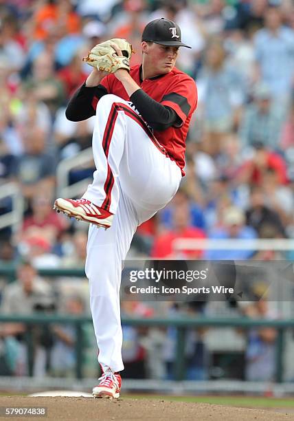 Louisville pitcher Kyle Funkhouser set to deliver a pitch during the College World Series game between the Vanderbilt Commodores and the Louisville...