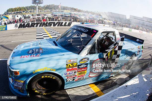Darrell Wallace Jr, NASCAR Camping World Truck Series driver of the 2015 NASCAR Hall of Fame Inductee Wendell Scott Toyota truck takes the checkard...