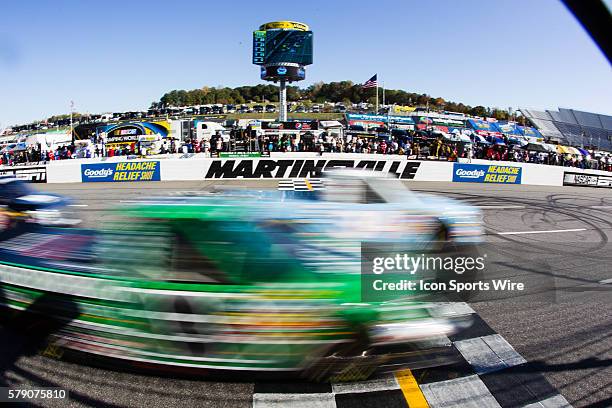 Darrell Wallace Jr, NASCAR Camping World Truck Series driver of the 2015 NASCAR Hall of Fame Inductee Wendell Scott Toyota truck lead the pack to the...