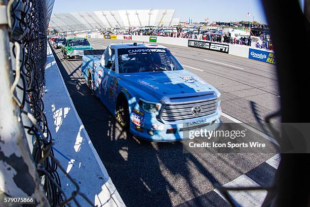 Darrell Wallace Jr, NASCAR Camping World Truck Series driver of the 2015 NASCAR Hall of Fame Inductee Wendell Scott Toyota truck races down the front...