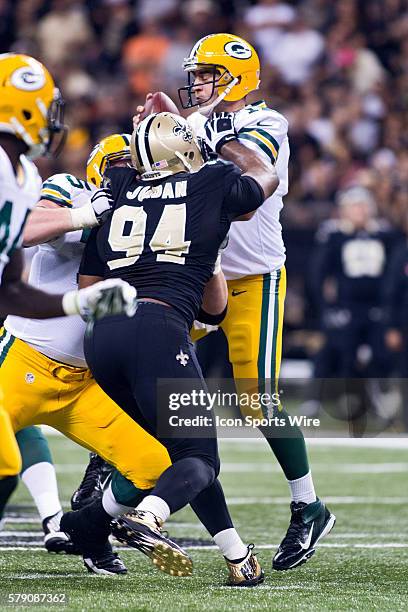 Green Bay Packers at New Orleans Saints; Green Bay Packers Quarterback Aaron Rodgers is sacked by New Orleans Saints Defensive End Cameron Jordan...