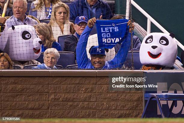 San Francisco Giants pandas stare at a Kansas City Royals fan during the World Series game 6 between the San Francisco Giants and the Kansas City...