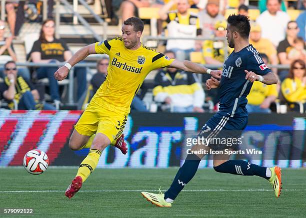 Josh Williams of the Columbus Crew crossing the ball in the box during the game between the Vancouver Whitecaps FC and the Columbus Crew at Crew...