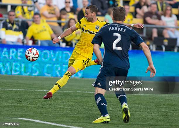 Josh Williams of the Columbus Crew crossing the ball in the ball during the game between the Vancouver Whitecaps FC and the Columbus Crew at Crew...