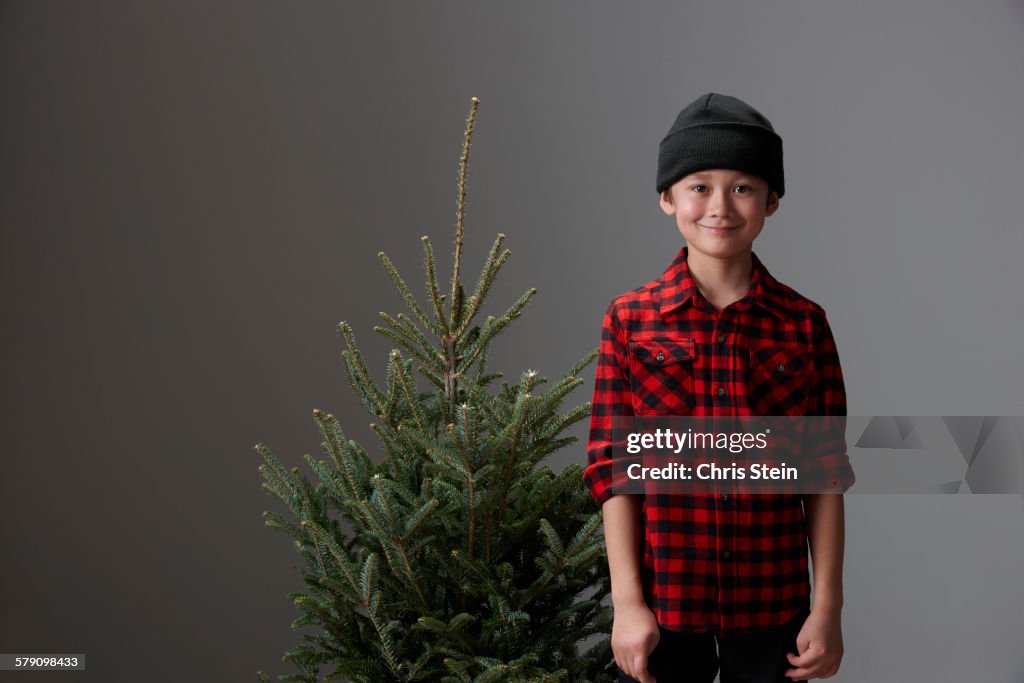 Asian Boys getting a Christmas Tree