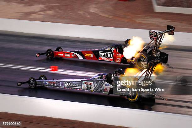 Brittany Force John Force Racing NHRA Top Fuel Dragster runs against J.R. Todd NHRA Top Fuel Dragster during the 14th Annual NHRA Toyota Nationals at...