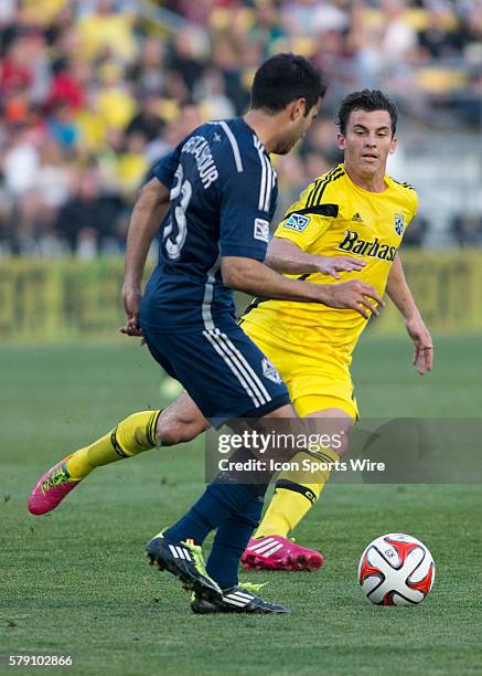 Bernardo Anor of the Columbus Crew passes the ball during the game between the Vancouver Whitecaps FC and the Columbus Crew at Crew Stadium in...