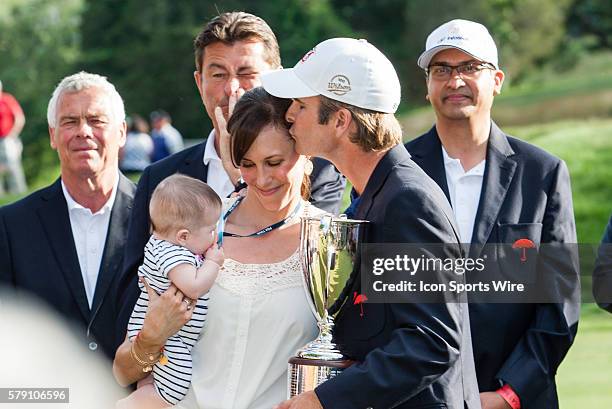 .Kevin Streelman kisses with Courtney after winning the Travelers Championship at TPC River Highlands in Cromwell, CT.