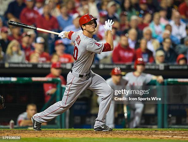 Los Angeles Angels left fielder Grant Green watches his hit fly into the outfield during an interleague Major League Baseball game between the...