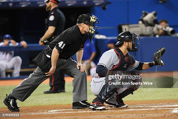 Home Plate umpire Jerry Meals and Cleveland Indians Catcher Yan Gomes [7599] during the Cleveland Indians 15-4 victory over the Toronto Blue Jays at...