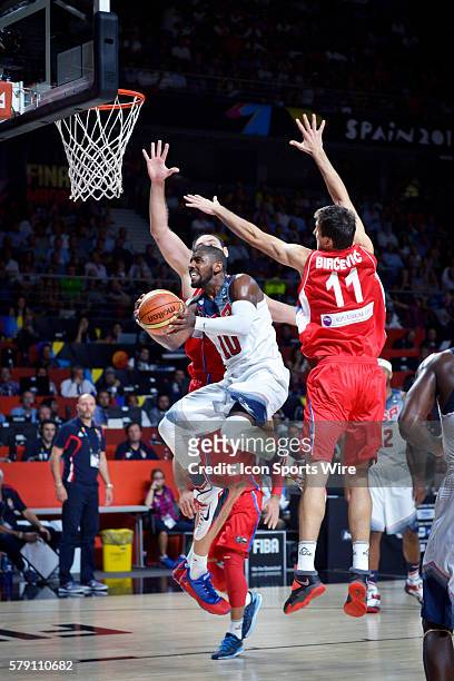Kyrie Irving of Team USA goes hard to the basket during Team USA's game versus Serbia in the 2014 FIBA Basketball World Cup championship at Palacio...