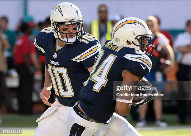 November 02 San Diego Chargers quarterback Kellen Clemens hands the football to running back Donald Brown during the second half in a game between...