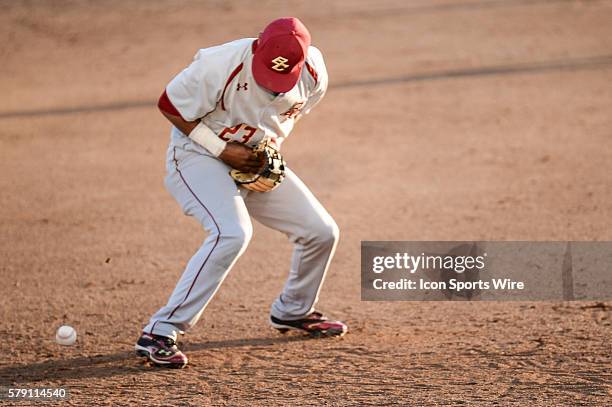 Boston College's 3rd baseman Gabriel Hernandez bobbles a grounder during the baseball game between the Boston College Eagles and Clemson Tigers at...